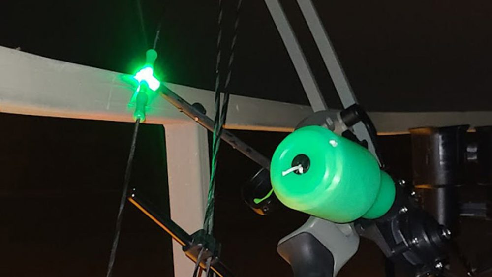 Lighted nock arrow nocked on a fishing bow.